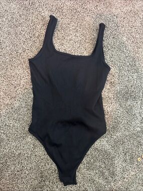 NWOT OQQ black bodysuit ( Size M )
